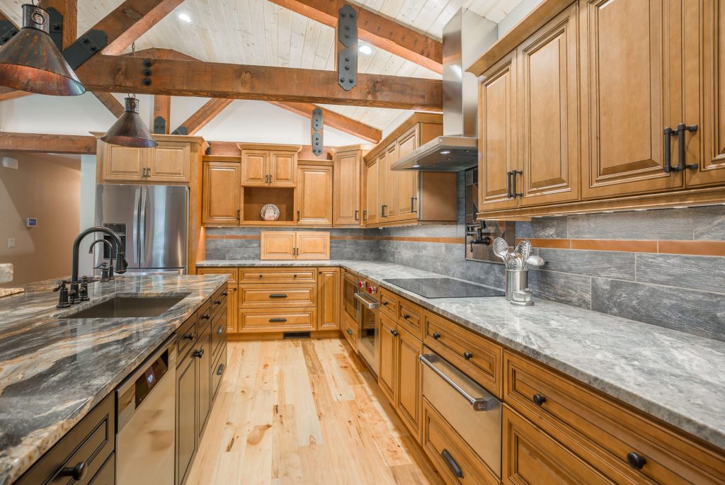CO66 Cinnamon Glazed Traditional Cabinet Door by J&K Cabinetry available at Aqua Kitchen